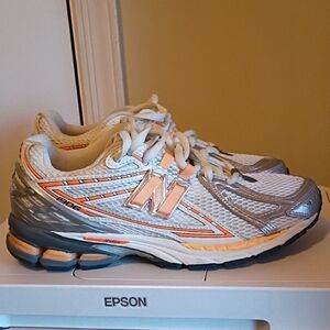 New Balance White and Orange Athletic Sneakers